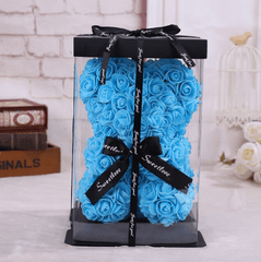 Ourson en roses bleu boite