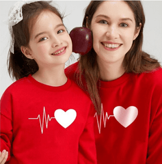 Pull mère fille coeur qui bat